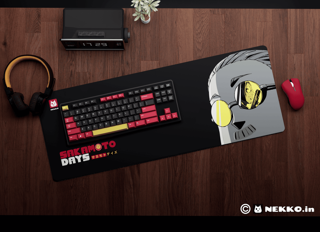 Close-up of Sakamoto- "The Legendary Hitman" desk mat showing high-quality print details