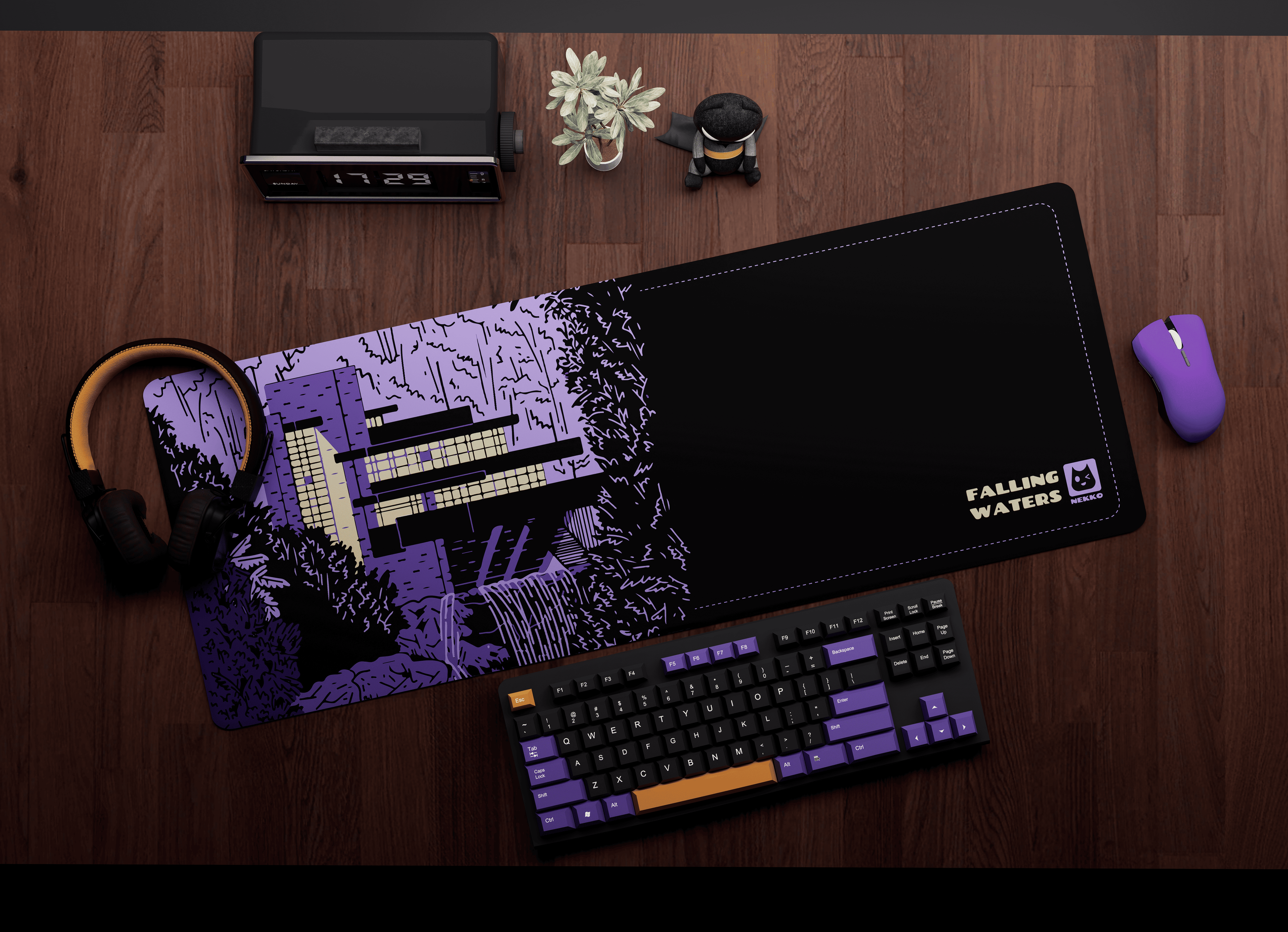 The Falling waters desk mat on workspace setup with keyboard and mouse